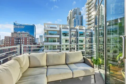 a view of a balcony with couches