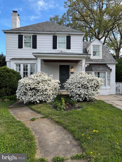 710 Regester Avenue Baltimore, MD 21212 - Photo 2 of 48 a front view of a house with a garden