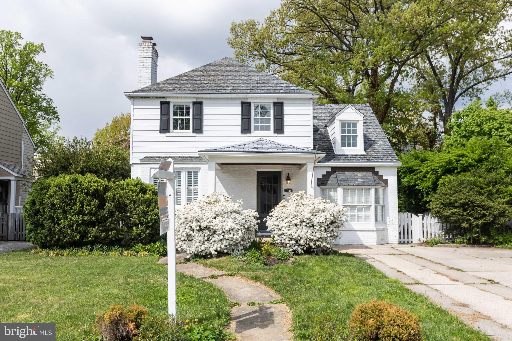 710 Regester Avenue Baltimore, MD 21212 - Photo 5 of 48 a front view of a house with garden