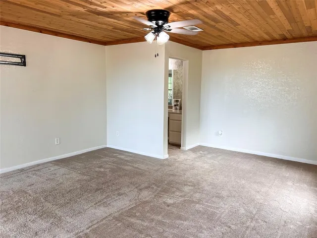 a view of a ceiling fan in a room