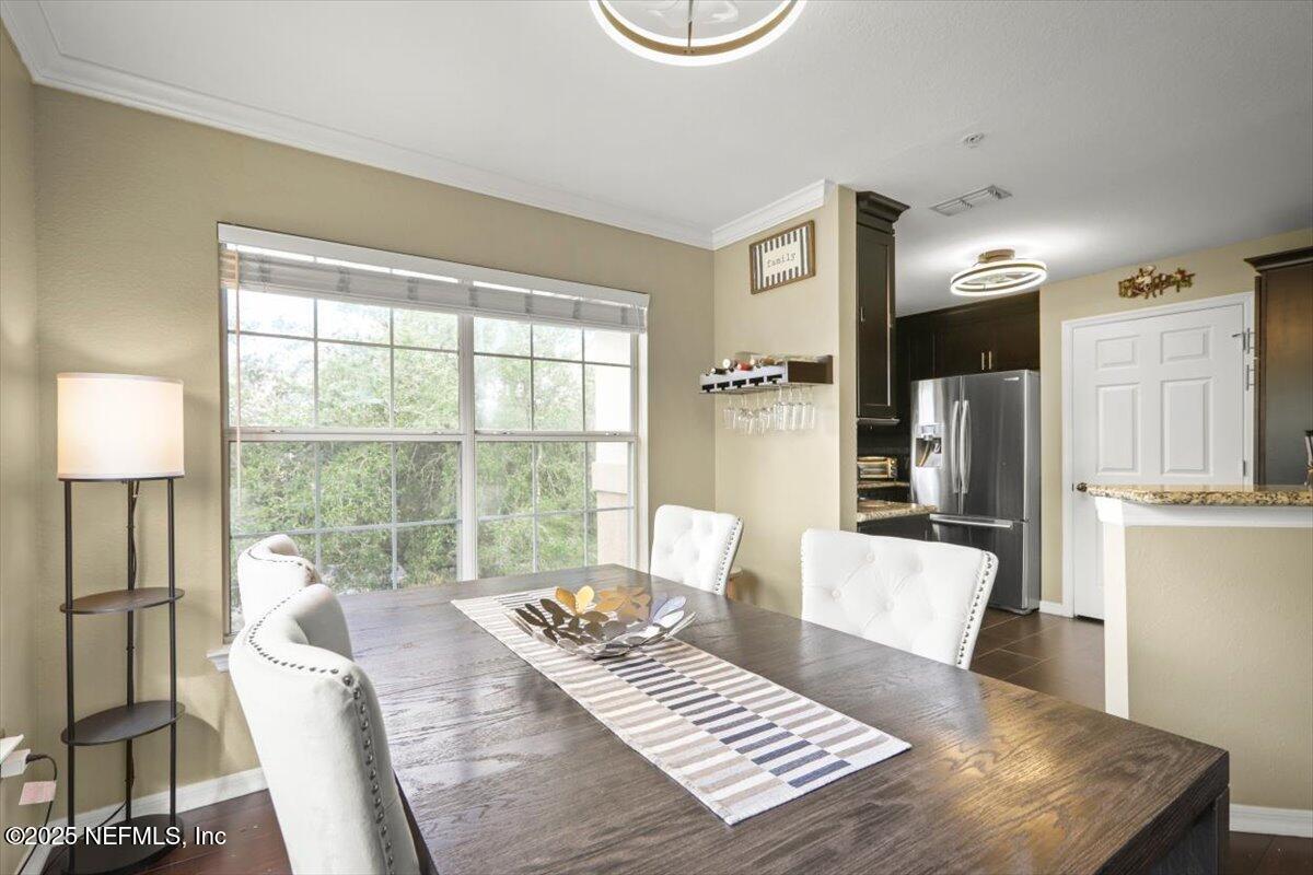 10961 Burnt Mill Road, Unit 1132 Jacksonville, FL 32256 - Photo 15 of 47 a living room with furniture and a window