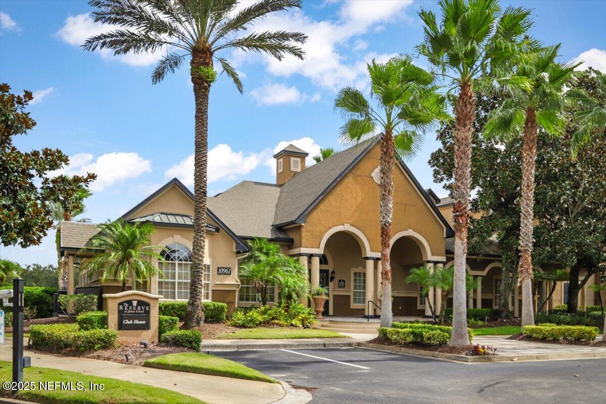 10961 Burnt Mill Road, Unit 1132 Jacksonville, FL 32256 - Photo 37 of 47 a view of multiple house with palm trees