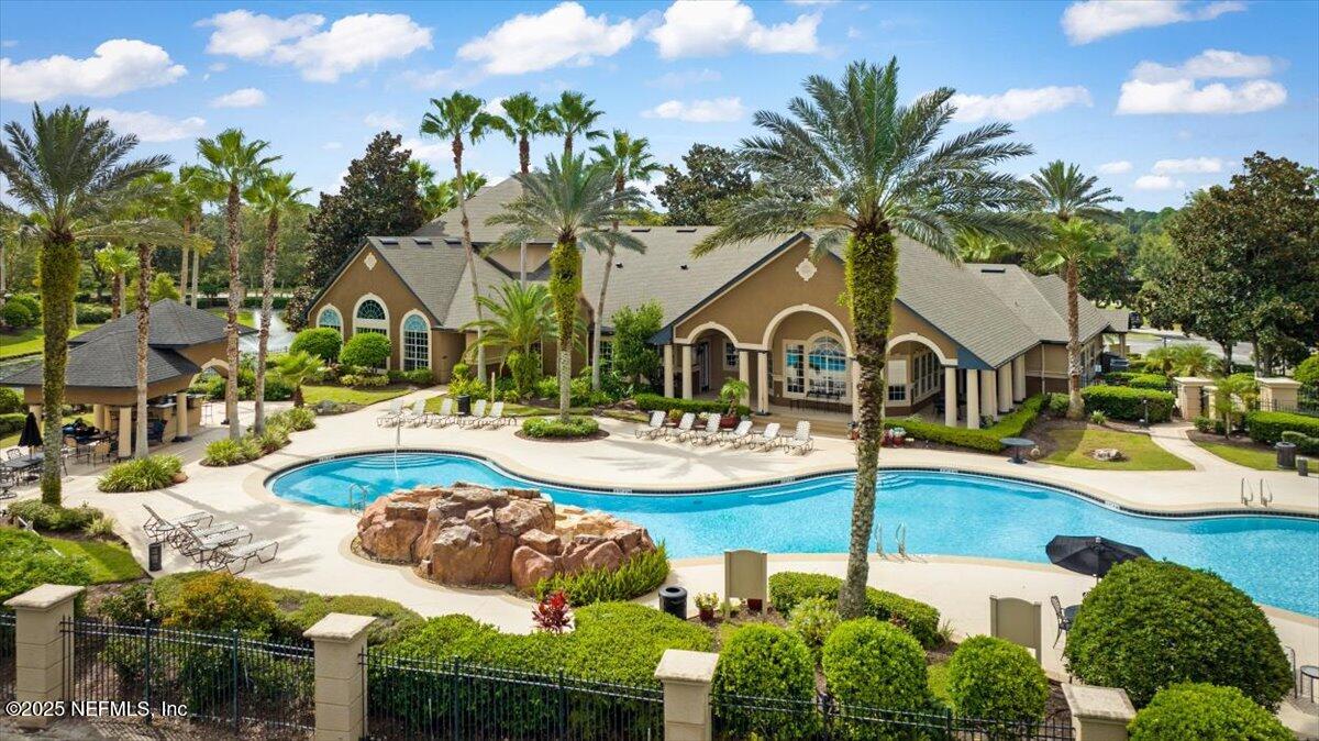10961 Burnt Mill Road, Unit 1132 Jacksonville, FL 32256 - Photo 47 of 47 a view of a house with swimming pool and porch