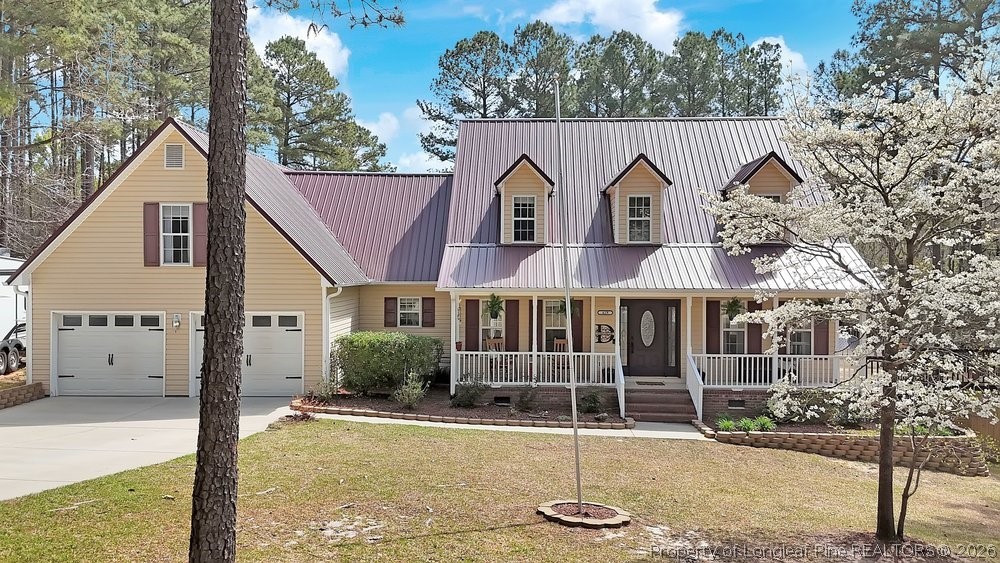 419 Senter Lane Bunnlevel, NC 28323 - Photo 1 of 49 front view of a house with a street