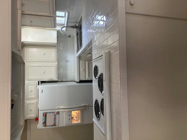 1001 Ridgeline Drive Round Rock, TX 78664 - Photo 4 of 11 a kitchen with a refrigerator and a sink
