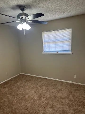 a view of a room with an empty space