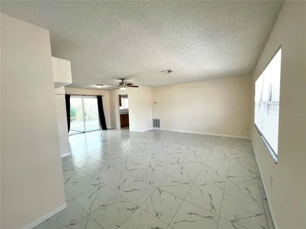 an empty room with a natural light