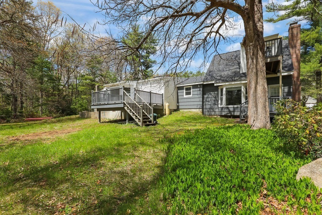 94 Fearing Hill Road Wareham, MA 02576 - Photo 35 of 41 a view of a house with backyard and a tree