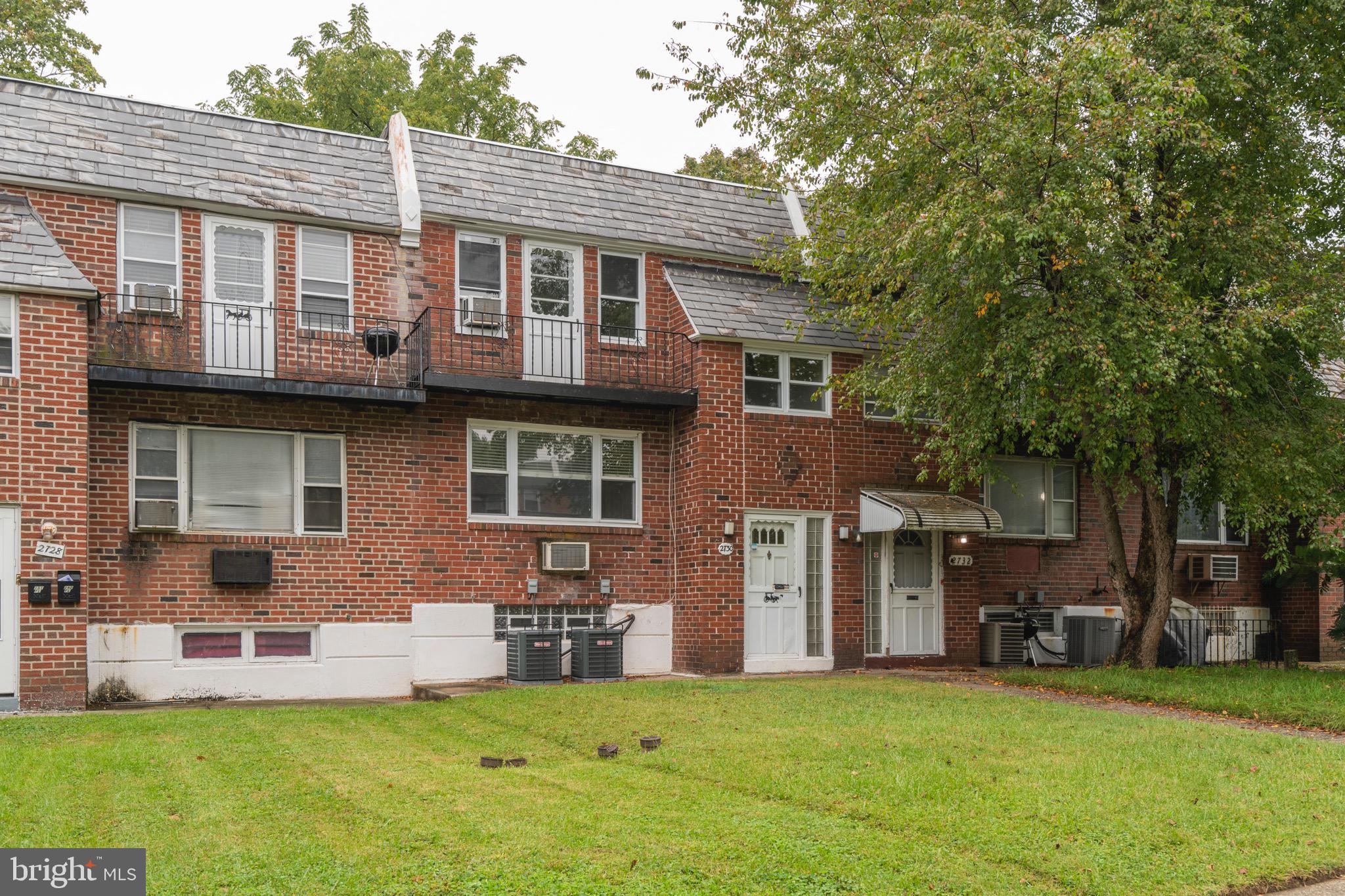 2730 Cranston Road Philadelphia, PA 19131 - Photo 1 of 25 a view of a house with a yard and a large tree