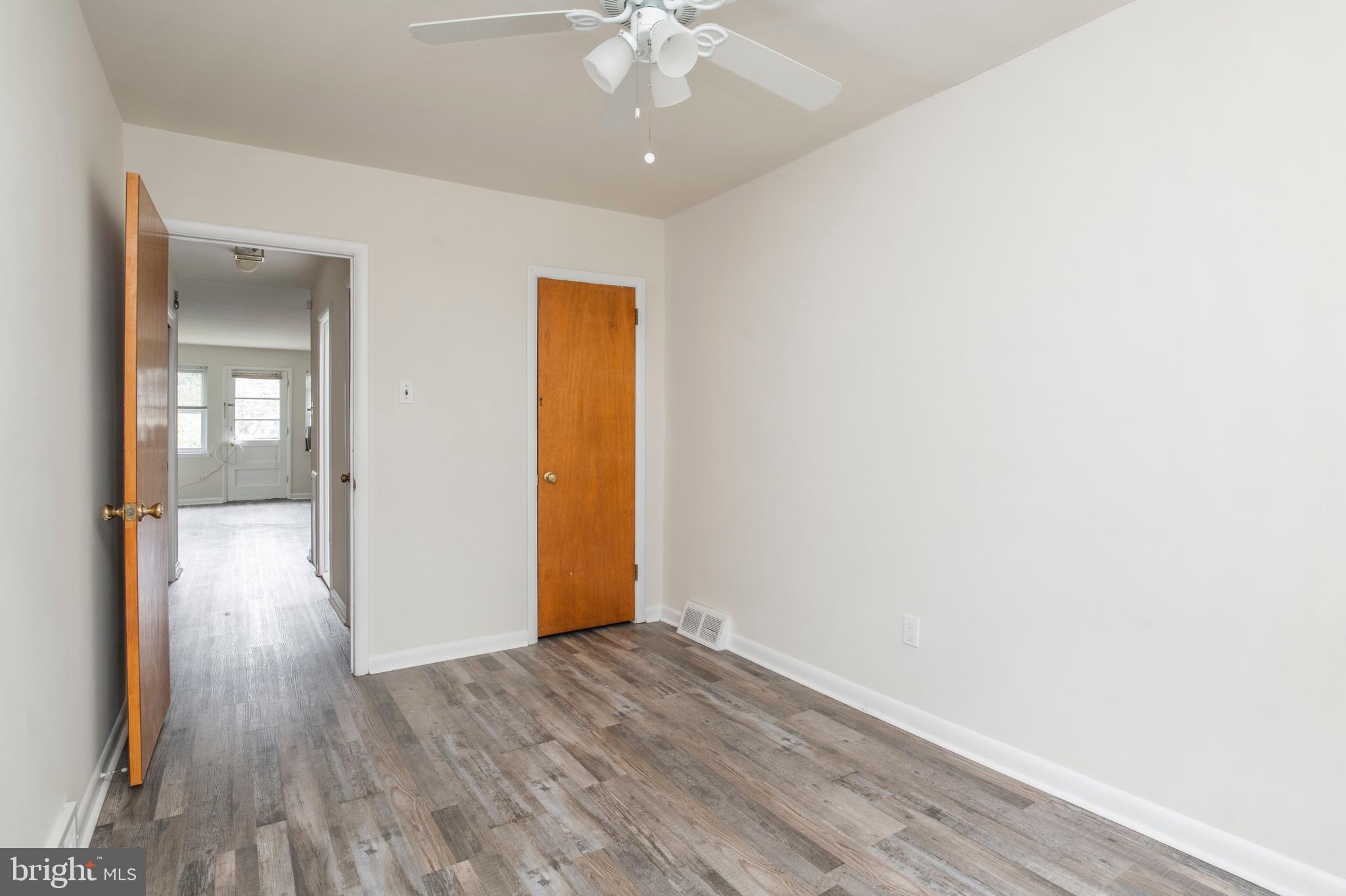 2730 Cranston Road Philadelphia, PA 19131 - Photo 18 of 25 a view of an empty room with wooden floor