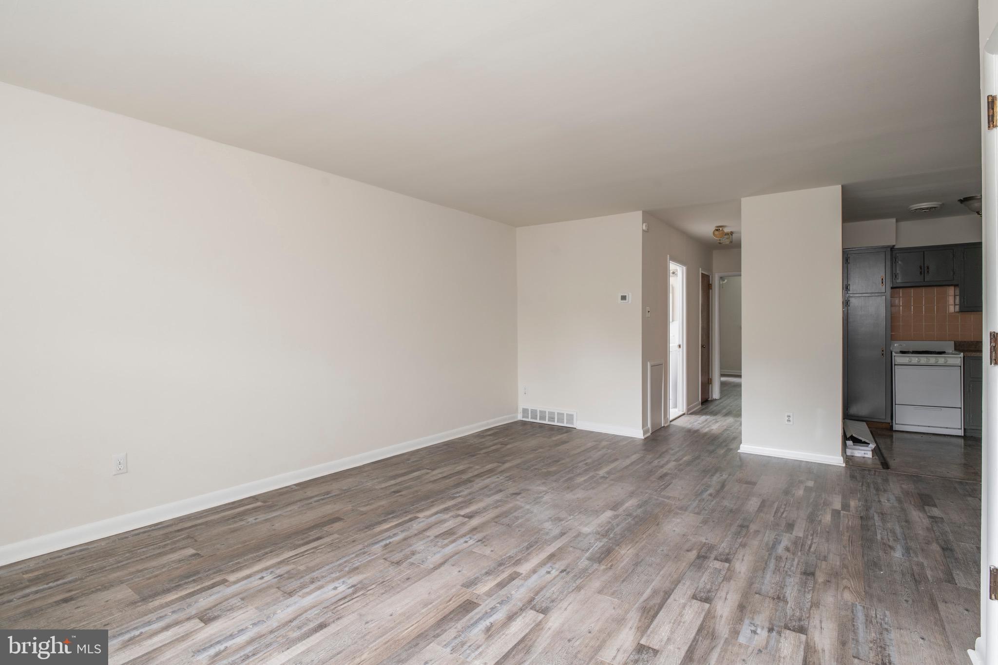 2730 Cranston Road Philadelphia, PA 19131 - Photo 4 of 25 a view of an empty room and wooden floor