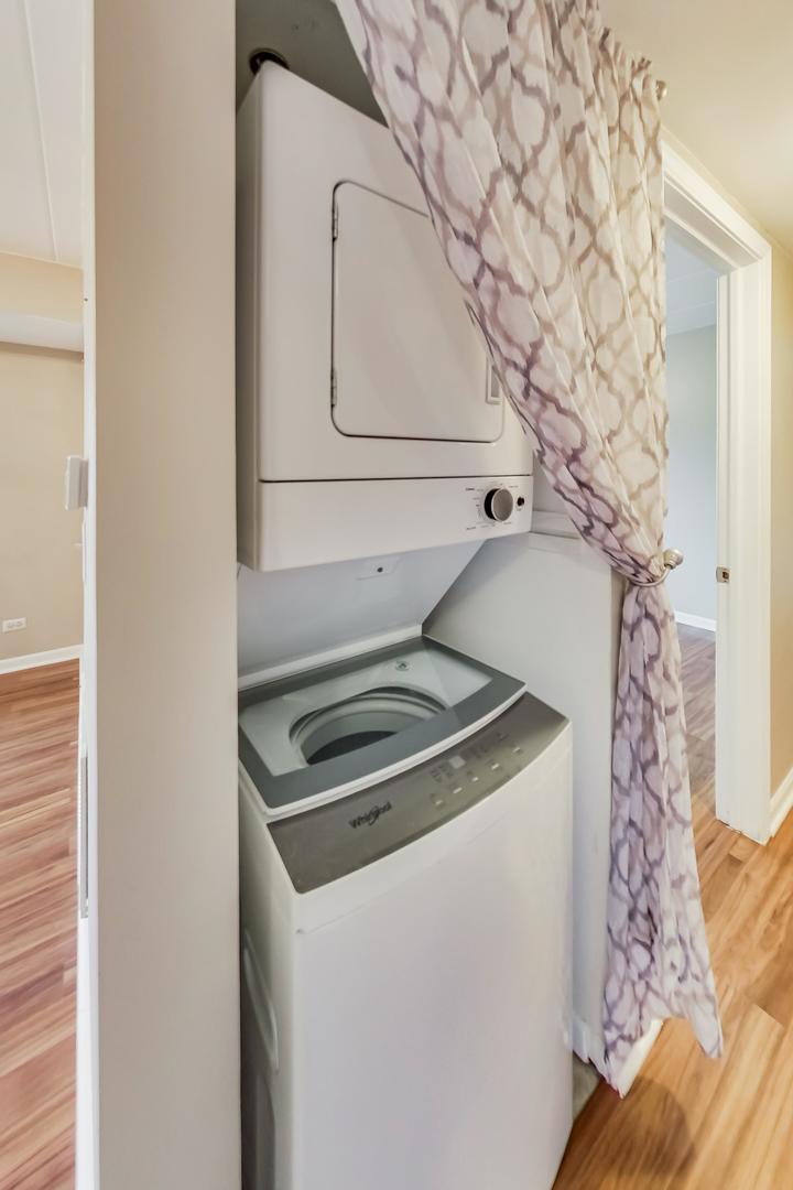 7326 40th Street, Unit 4D Lyons, IL 60534 - Photo 17 of 22 a utility room with a washer and dryer