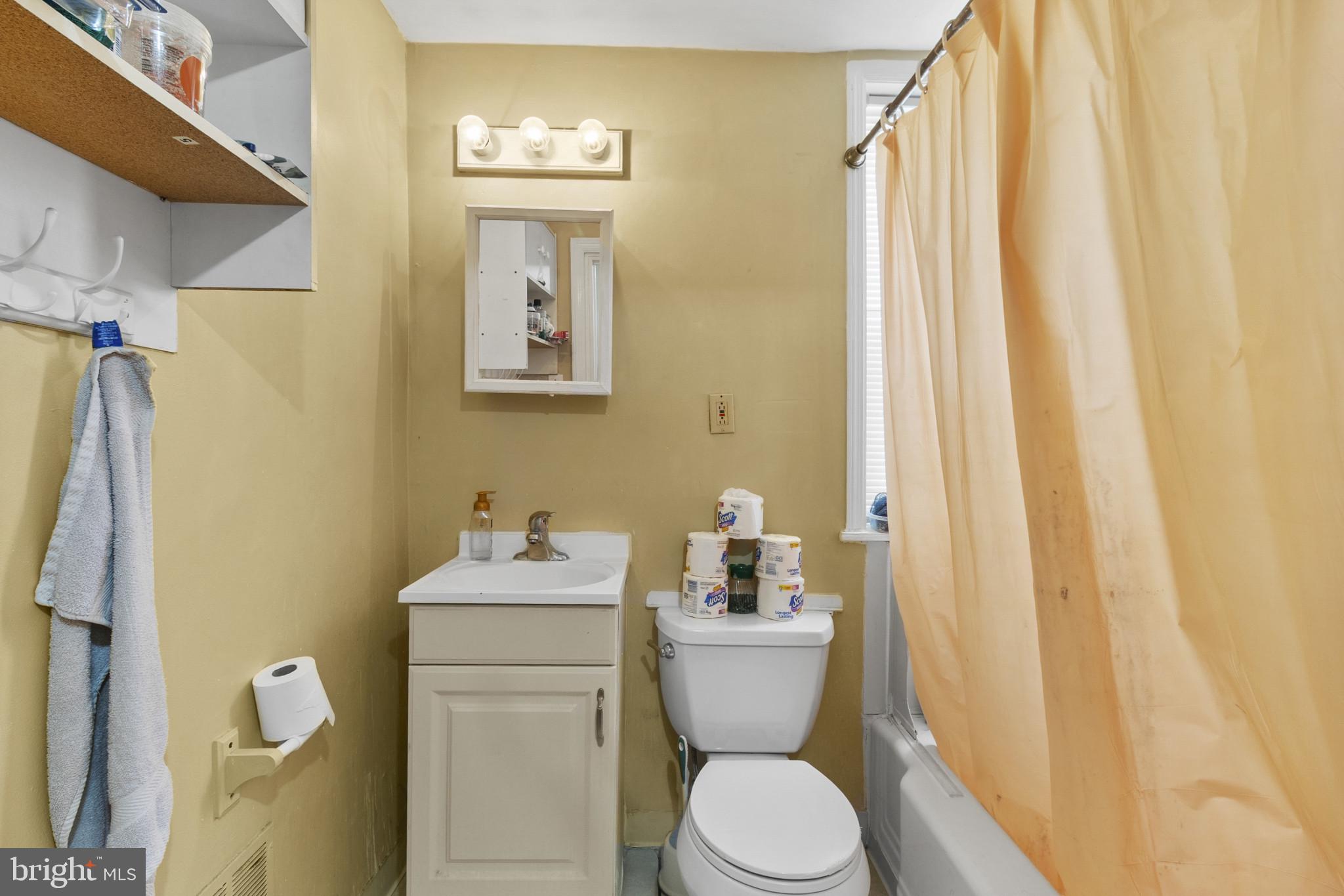 516 Kohn Street Norristown, PA 19401 - Photo 21 of 28 a white toilet sitting next to a bathroom sink