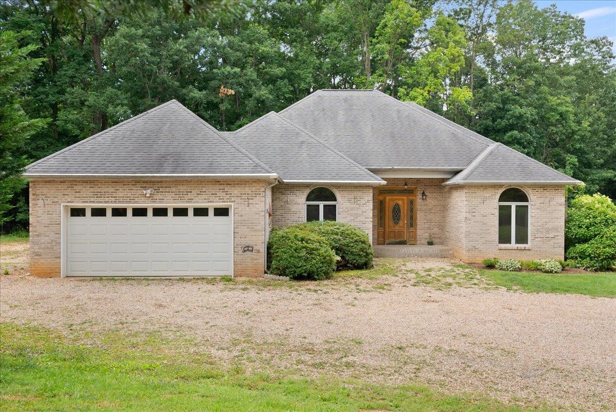 381 Enterprise Road Churchville, VA 24421 - Photo 6 of 43 a front view of a house with a yard and garage