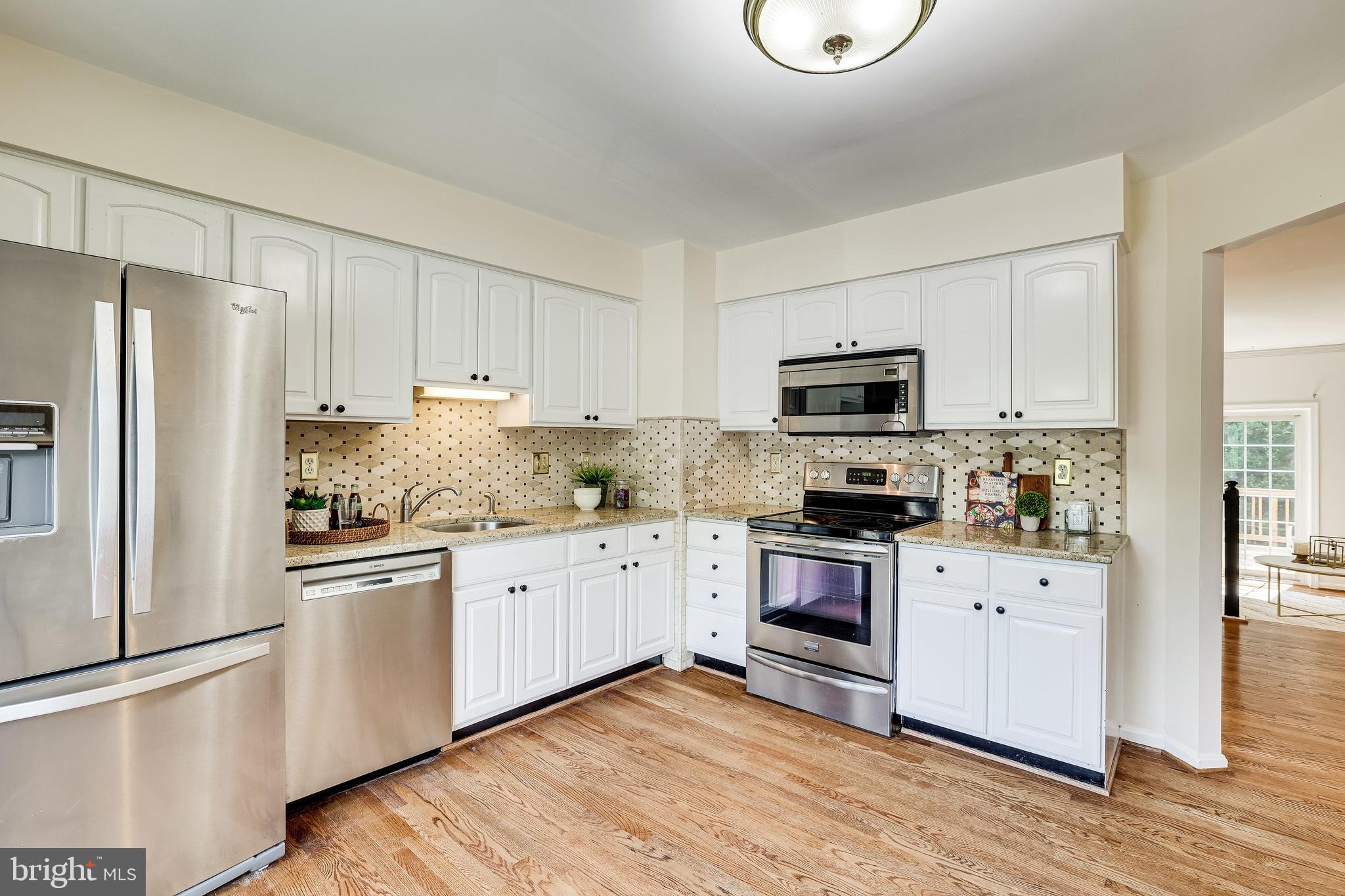 11962 Sentinel Point Court Reston, VA 20191 - Photo 8 of 62 Enjoy stainless steel appliances, too!