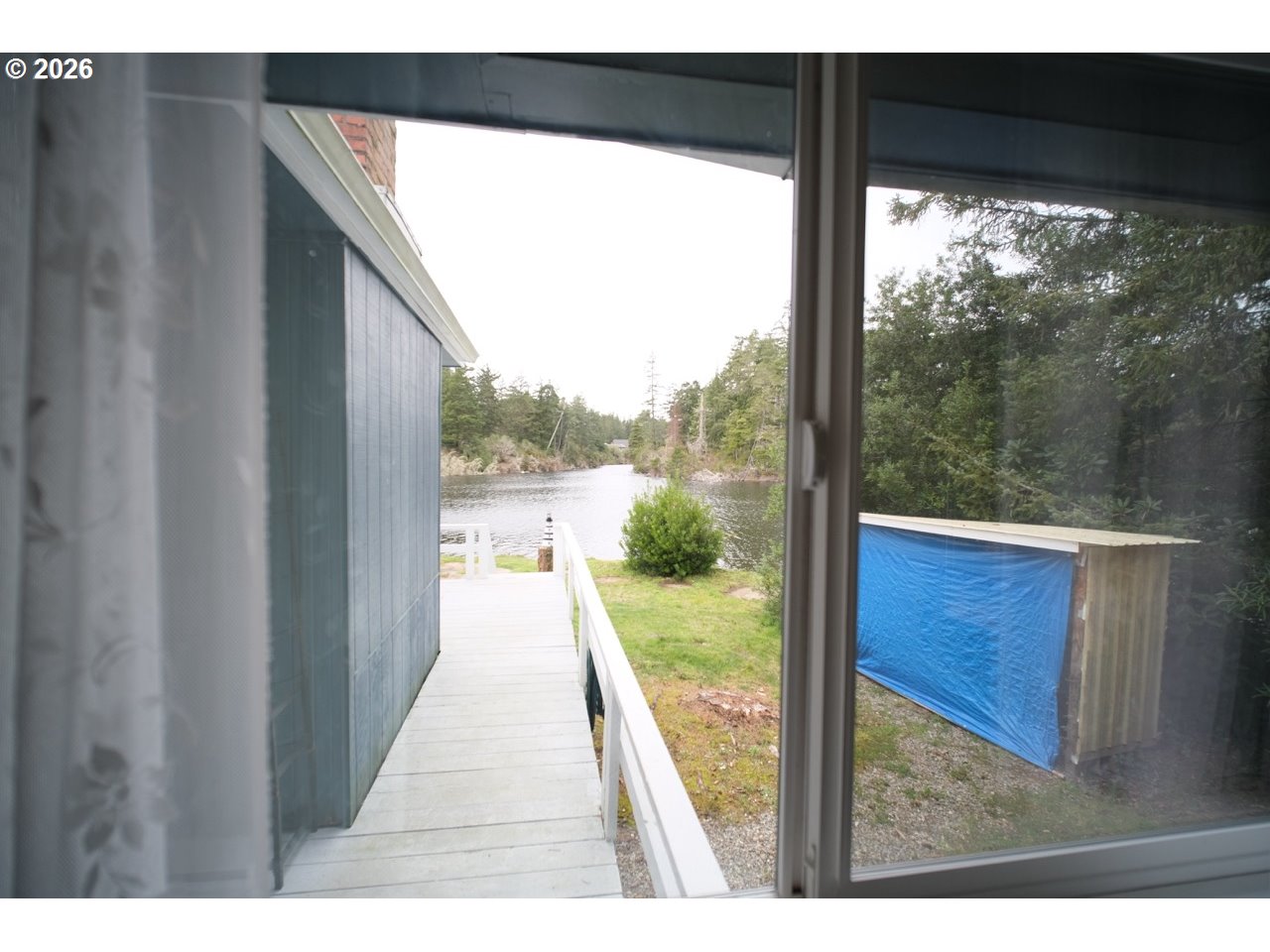 70214 Lakewood Road North Bend, OR 97459 - Photo 36 of 39 a view of a porch