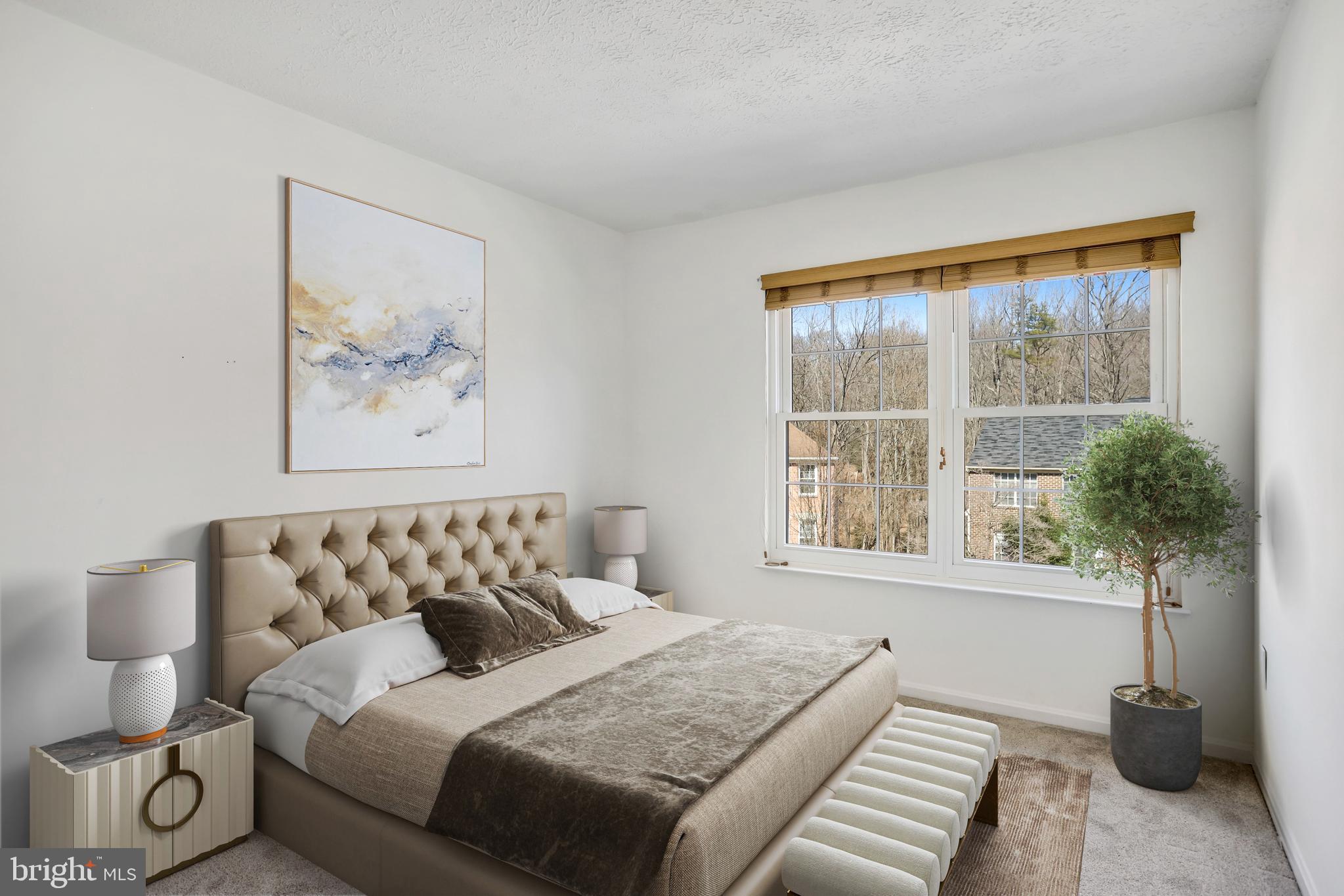 11440 Encore Drive Silver Spring, MD 20901 - Photo 20 of 36 a bedroom with a bed and a window