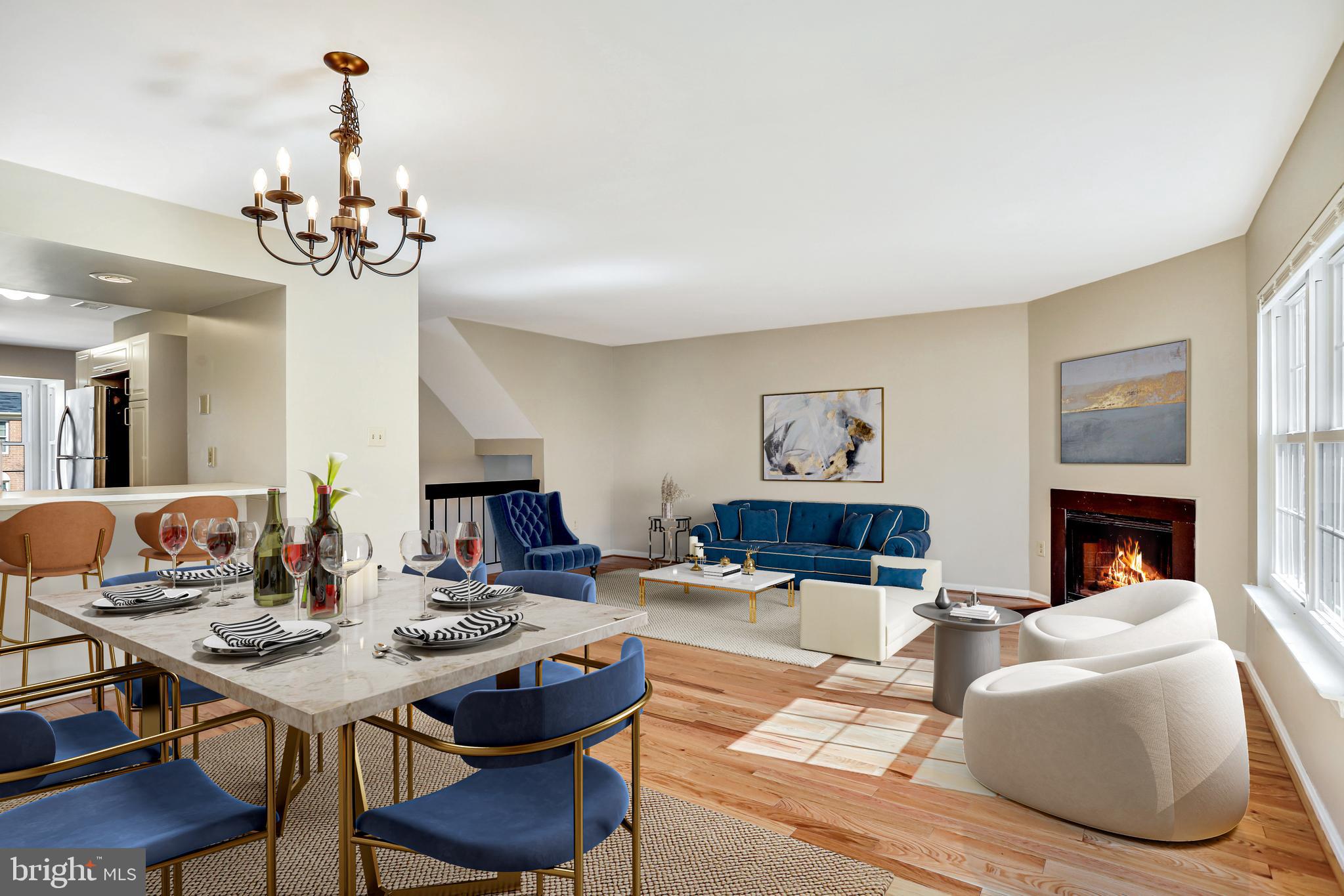 11440 Encore Drive Silver Spring, MD 20901 - Photo 3 of 36 a view of a livingroom with furniture a chandelier and wooden floor