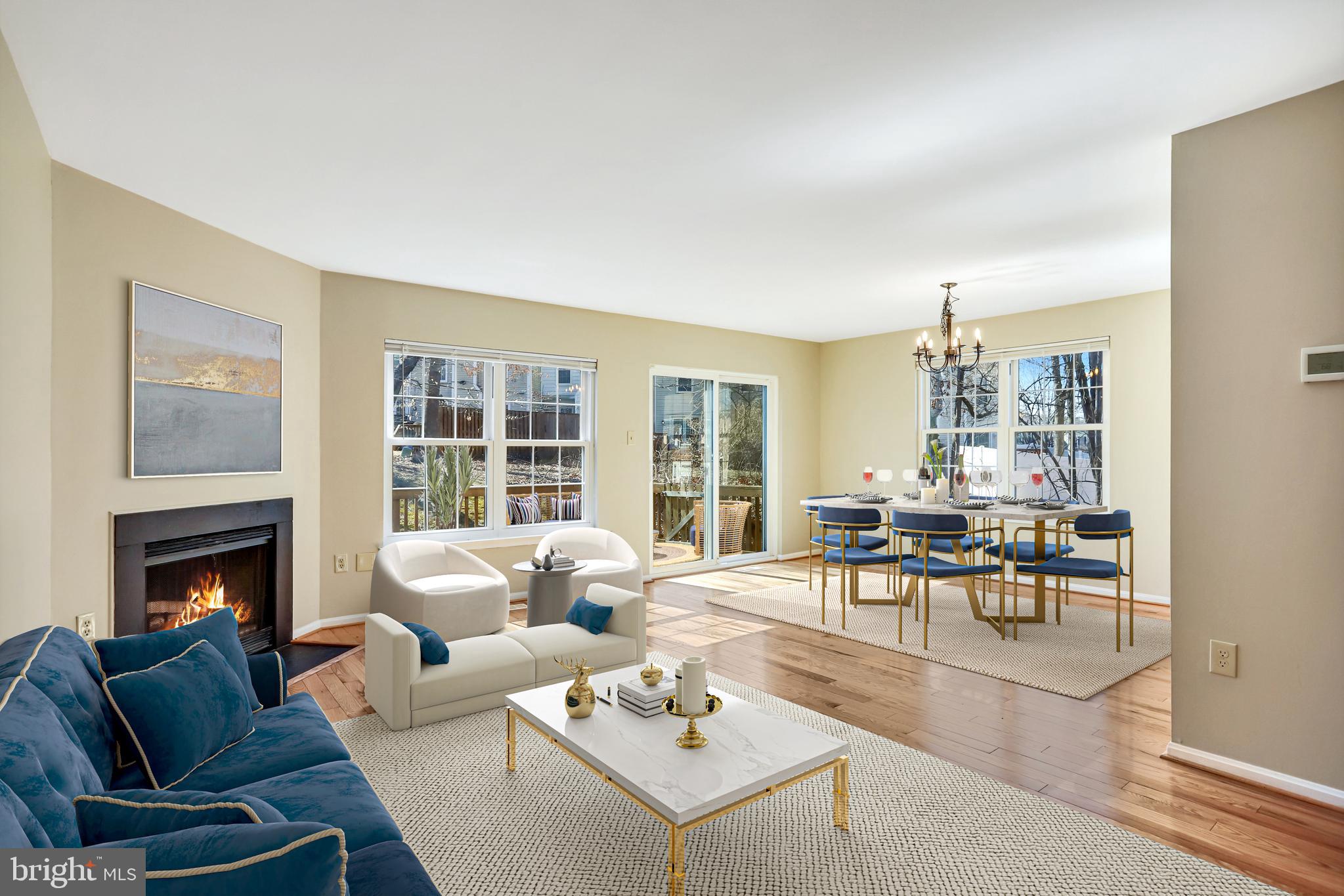 11440 Encore Drive Silver Spring, MD 20901 - Photo 4 of 36 a living room with fireplace furniture and a large window