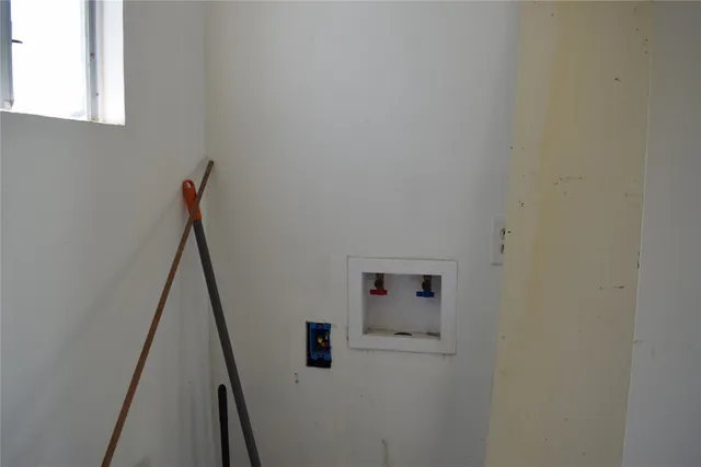 a view of hallway with stairs