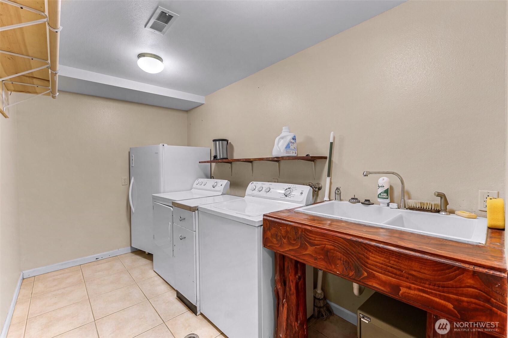 46003 Concrete Sauk Valley Road Concrete, WA 98237 - Photo 25 of 40 a room with a sink and cabinets