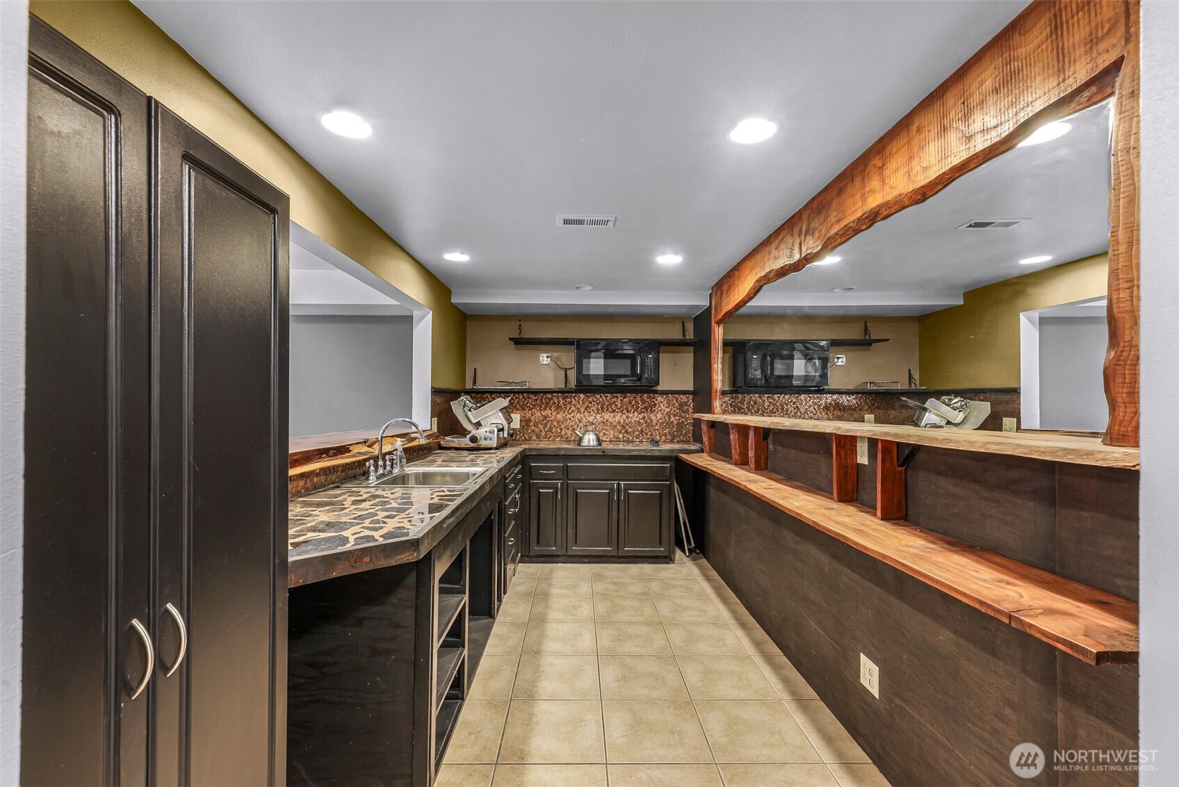 46003 Concrete Sauk Valley Road Concrete, WA 98237 - Photo 28 of 40 a large kitchen with stainless steel appliances granite countertop lots of counter top space