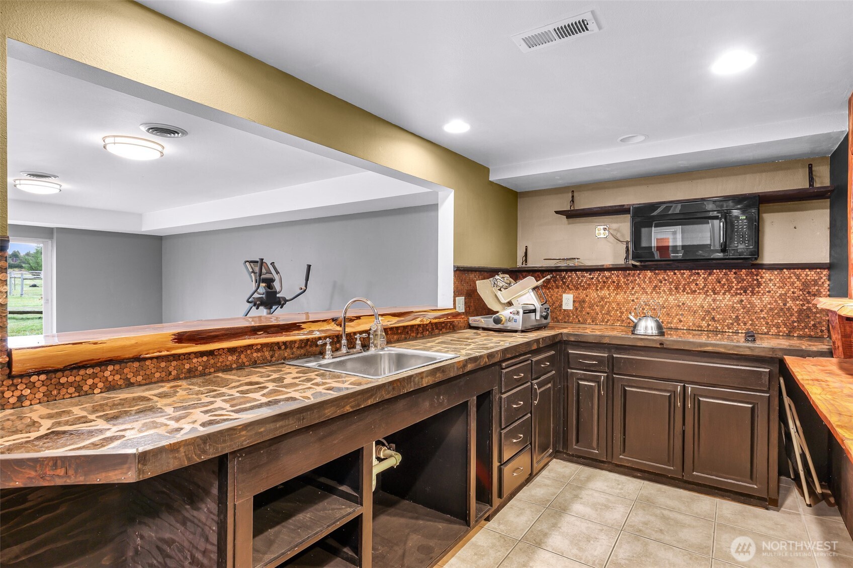 46003 Concrete Sauk Valley Road Concrete, WA 98237 - Photo 29 of 40 a kitchen with a sink and cabinets
