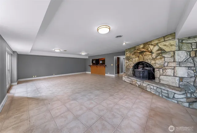 a view of hallway with wooden floor