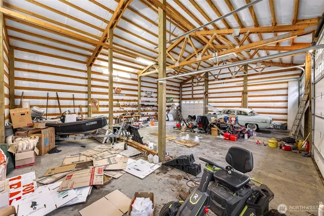 a view of a swimming pool with a yard