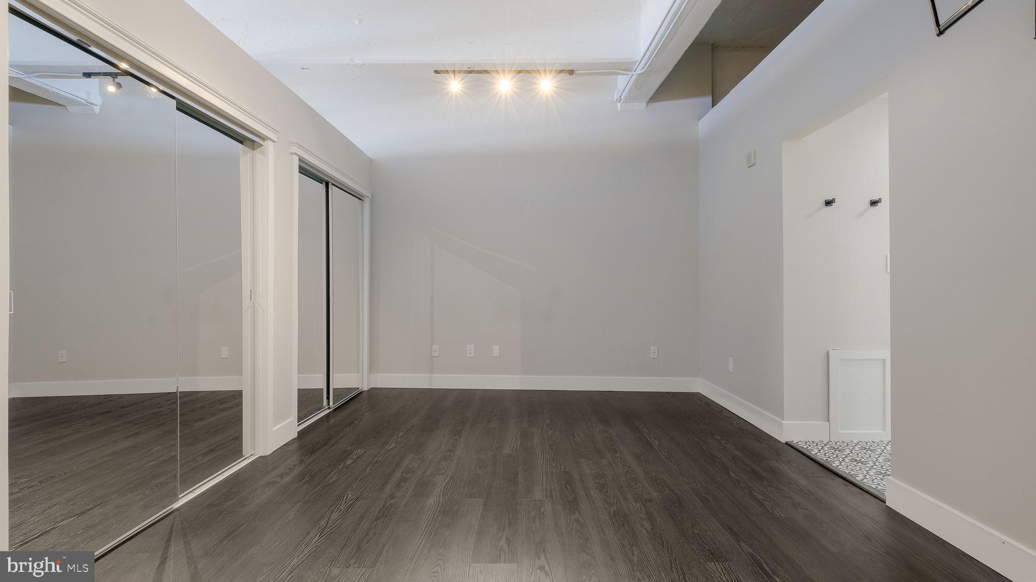 444 North 4th Street, Unit 601 Philadelphia, PA 19123 - Photo 17 of 38 a view of a room with wooden floor