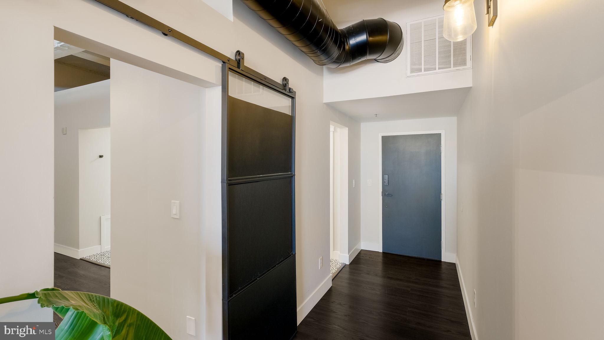 444 North 4th Street, Unit 601 Philadelphia, PA 19123 - Photo 21 of 38 a view of hallway with washer and dryer