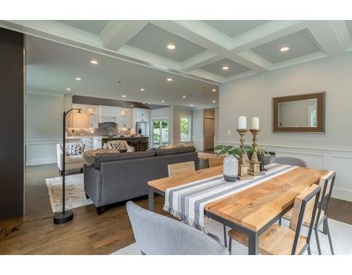 93 Pond Brook Road Newton, MA 02467 - Photo 16 of 33 a living room with stainless steel appliances kitchen island granite countertop furniture and a kitchen view
