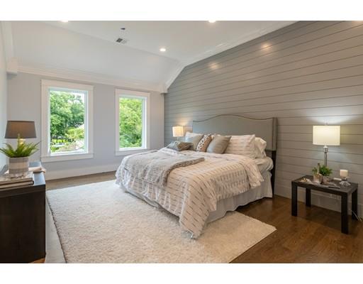 93 Pond Brook Road Newton, MA 02467 - Photo 26 of 33 a bedroom with a bed and a window