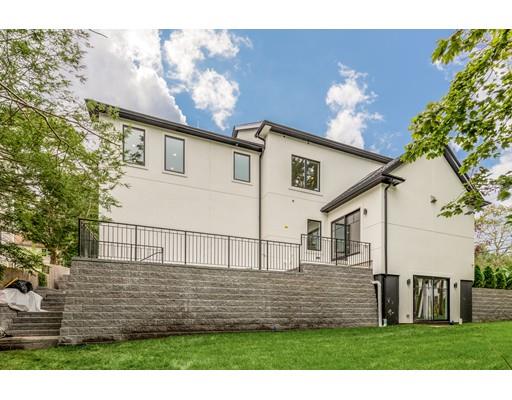 93 Pond Brook Road Newton, MA 02467 - Photo 32 of 33 a view front of house with a yard