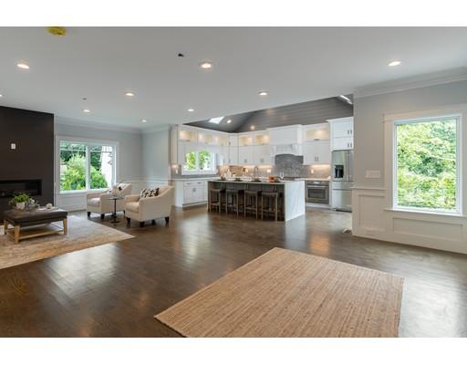 93 Pond Brook Road Newton, MA 02467 - Photo 8 of 33 a living room with furniture and a kitchen view