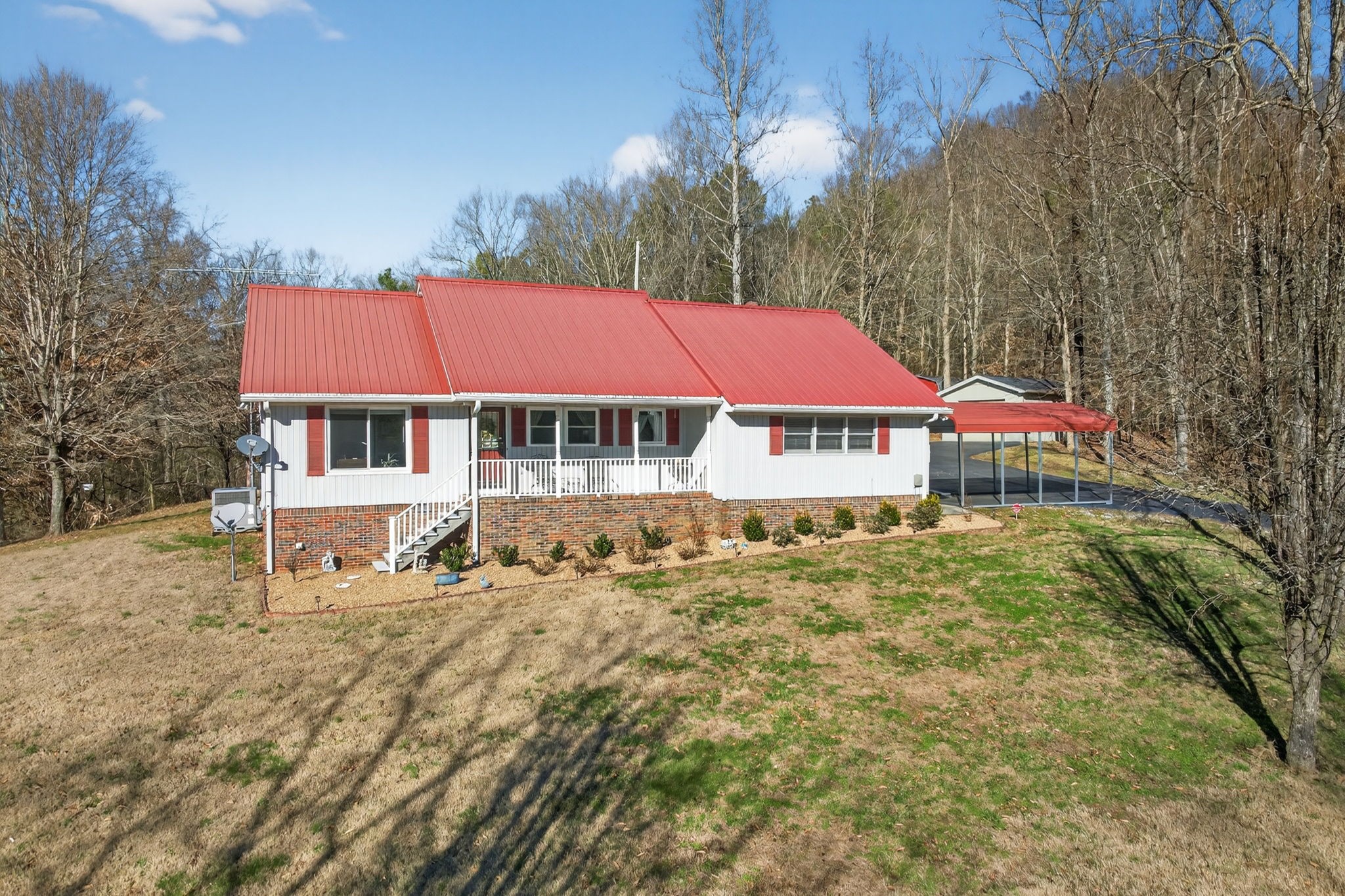 2895 Free State Road Gainesboro, TN 38562 - Photo 1 of 42 a front view of a house with a yard
