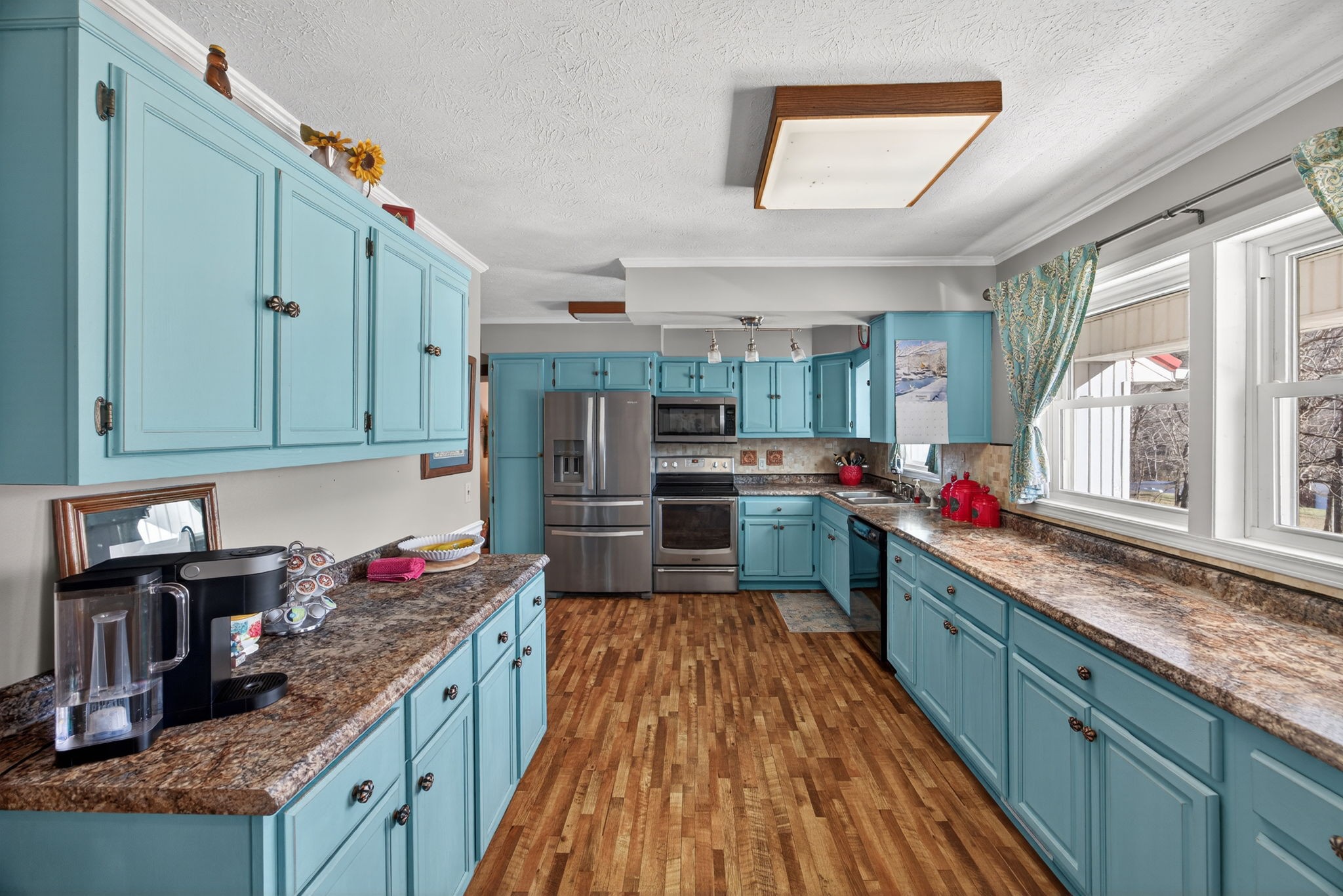 2895 Free State Road Gainesboro, TN 38562 - Photo 17 of 42 a kitchen with stainless steel appliances granite countertop a sink and cabinets