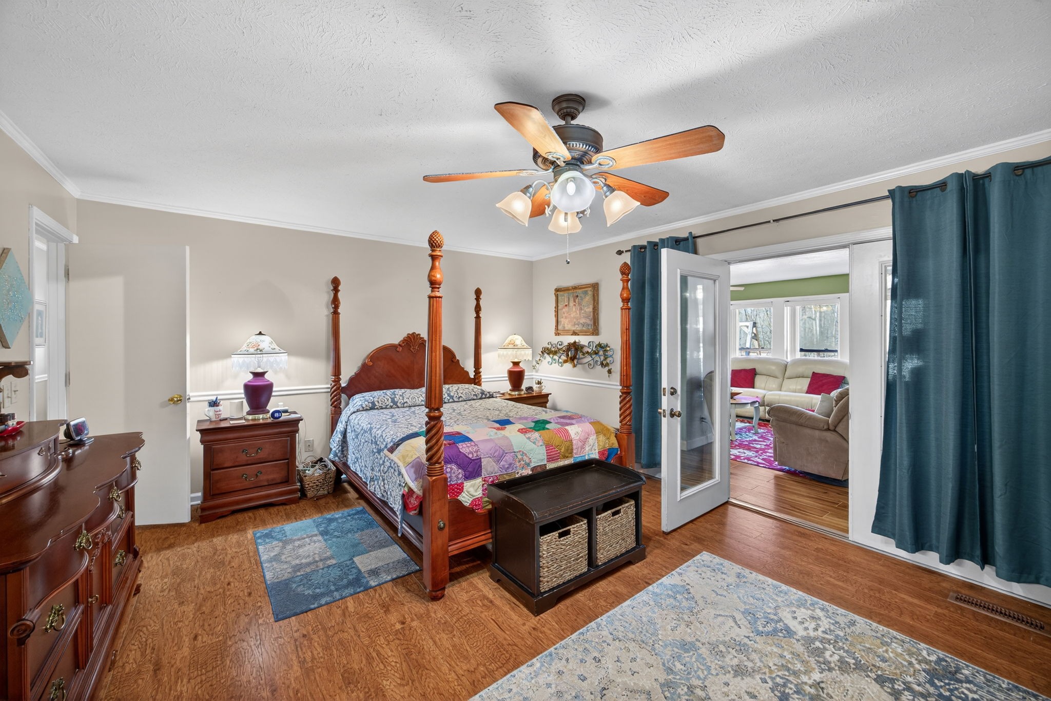 2895 Free State Road Gainesboro, TN 38562 - Photo 26 of 42 a bedroom with furniture and a chandelier