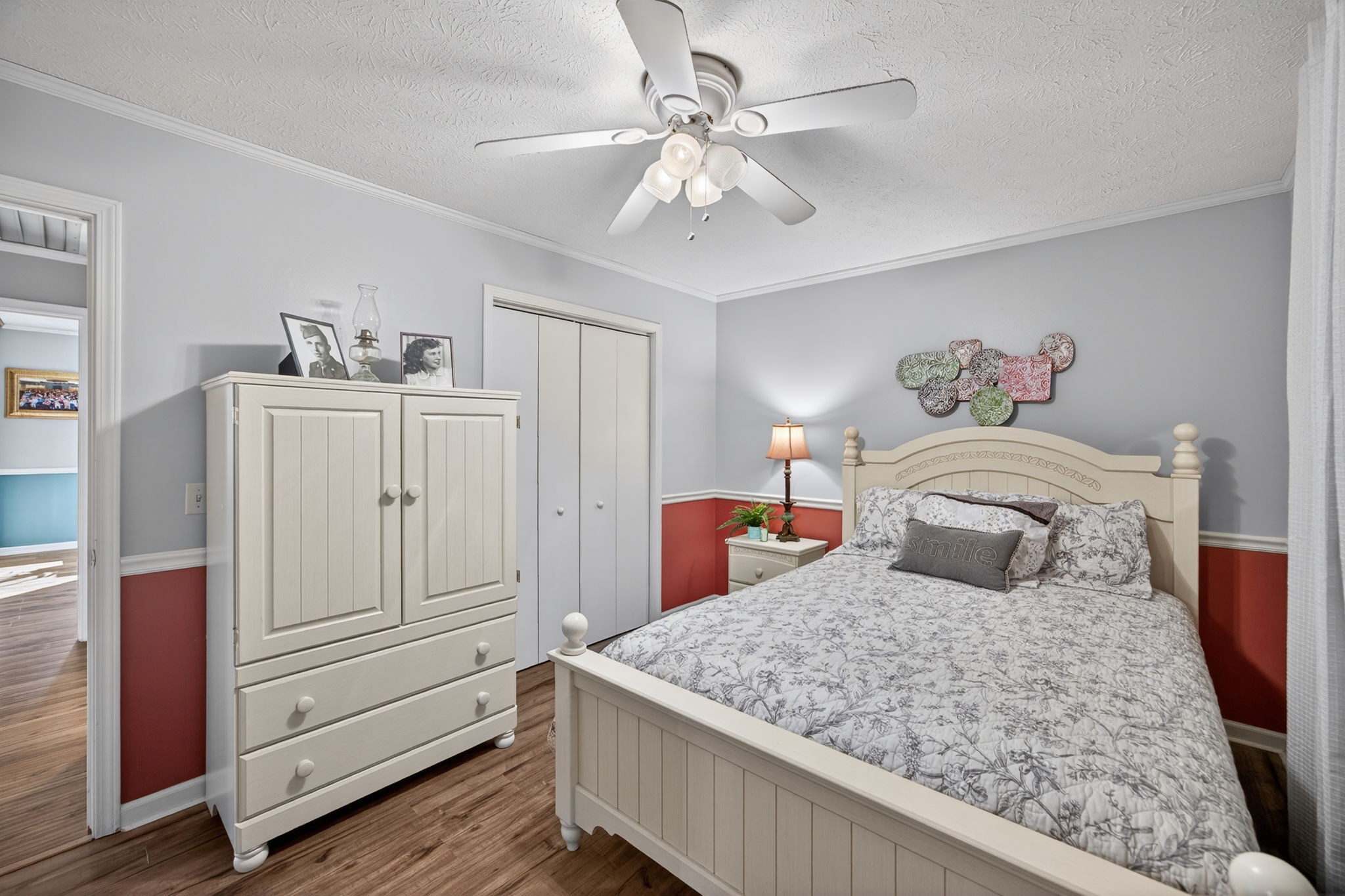 2895 Free State Road Gainesboro, TN 38562 - Photo 31 of 42 a bedroom with a large bed and a chandelier