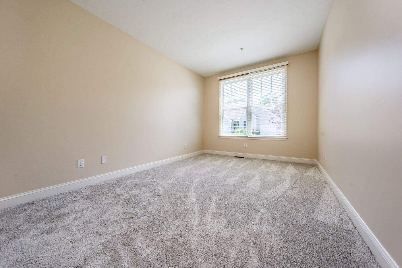 45 Grey Hawk Drive Mashpee, MA 02649 - Photo 13 of 23 an empty room with windows