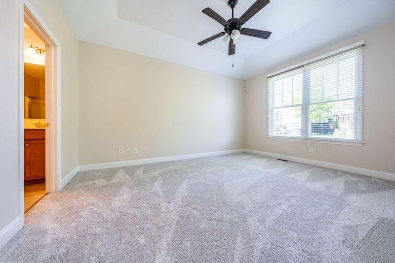 45 Grey Hawk Drive Mashpee, MA 02649 - Photo 9 of 23 an empty room with a window and a fan