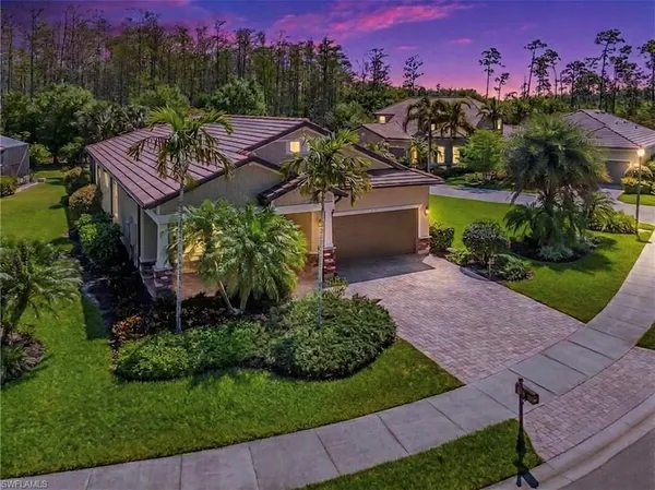 a view of a house with a garden