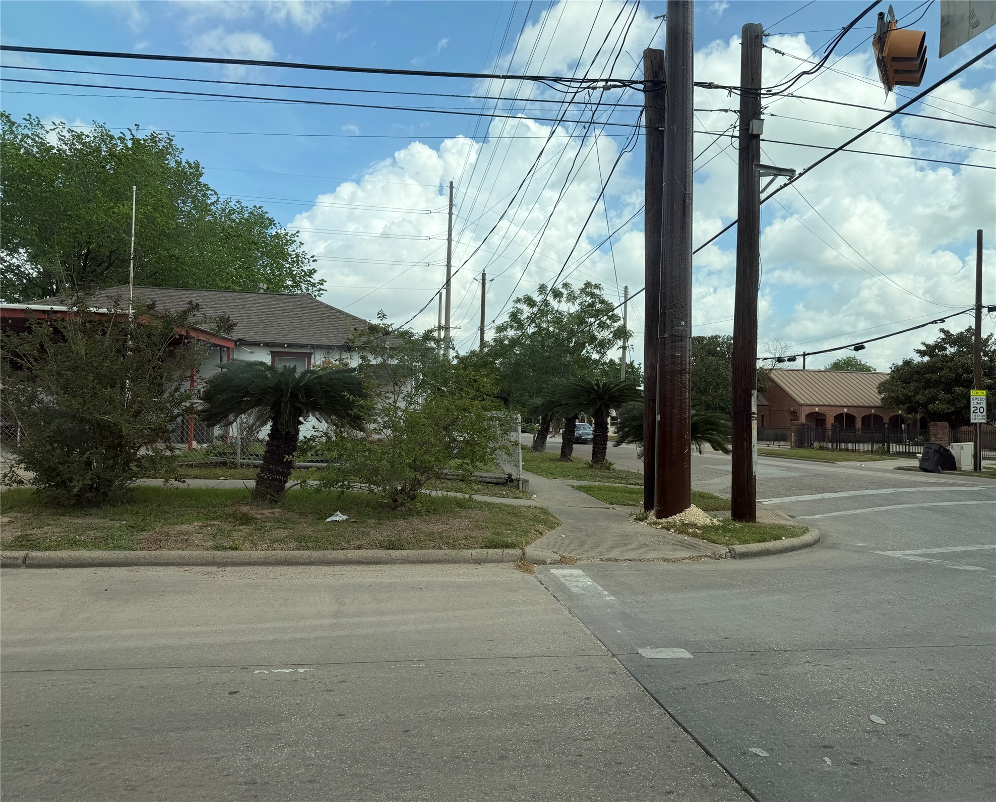 703 76th Street Houston, TX 77012 - Photo 3 of 23 a view of a yard with a bench in front of it