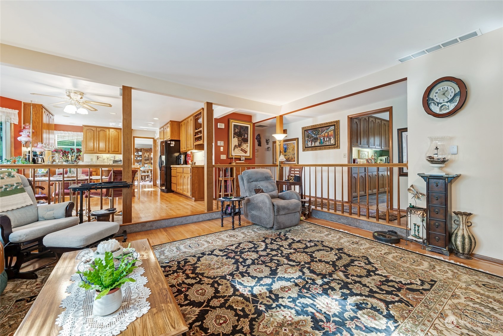 2914 184th Place Southeast Bothell, WA 98012 - Photo 15 of 40 a living room with furniture a rug and white walls