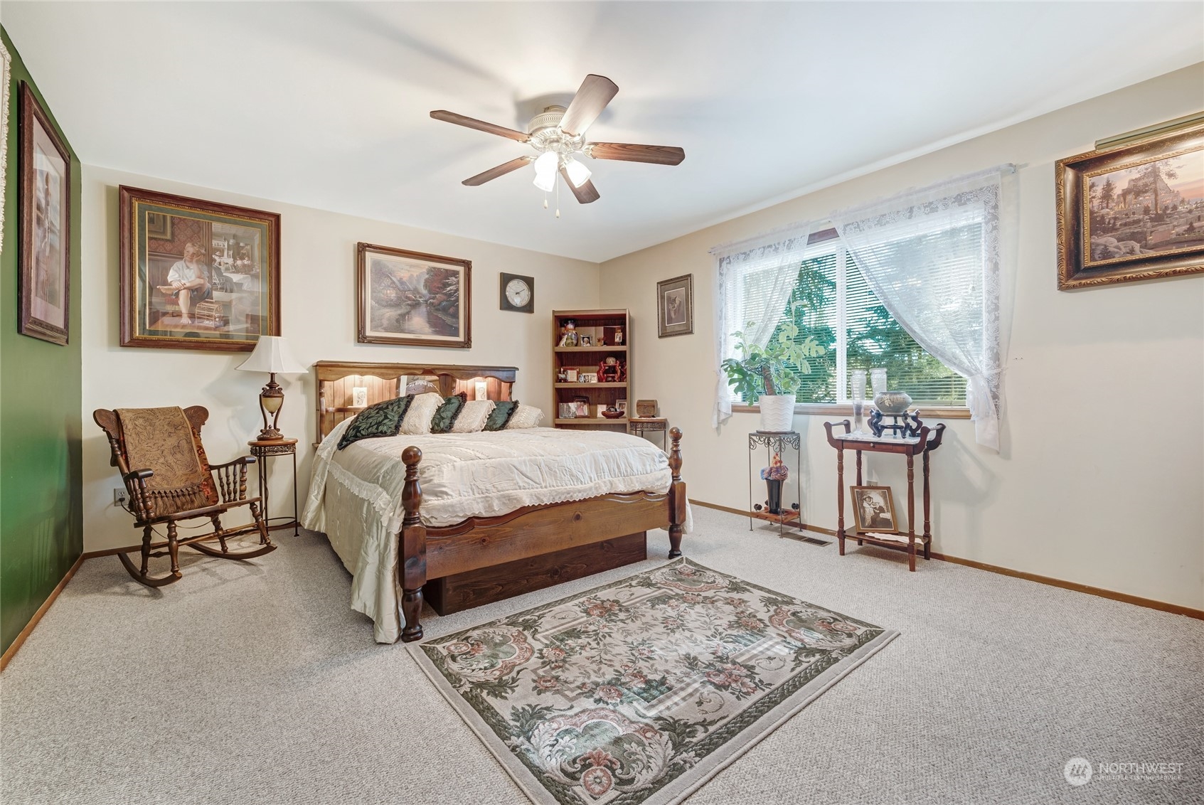 2914 184th Place Southeast Bothell, WA 98012 - Photo 16 of 40 a bedroom with a bed a chair and a large window