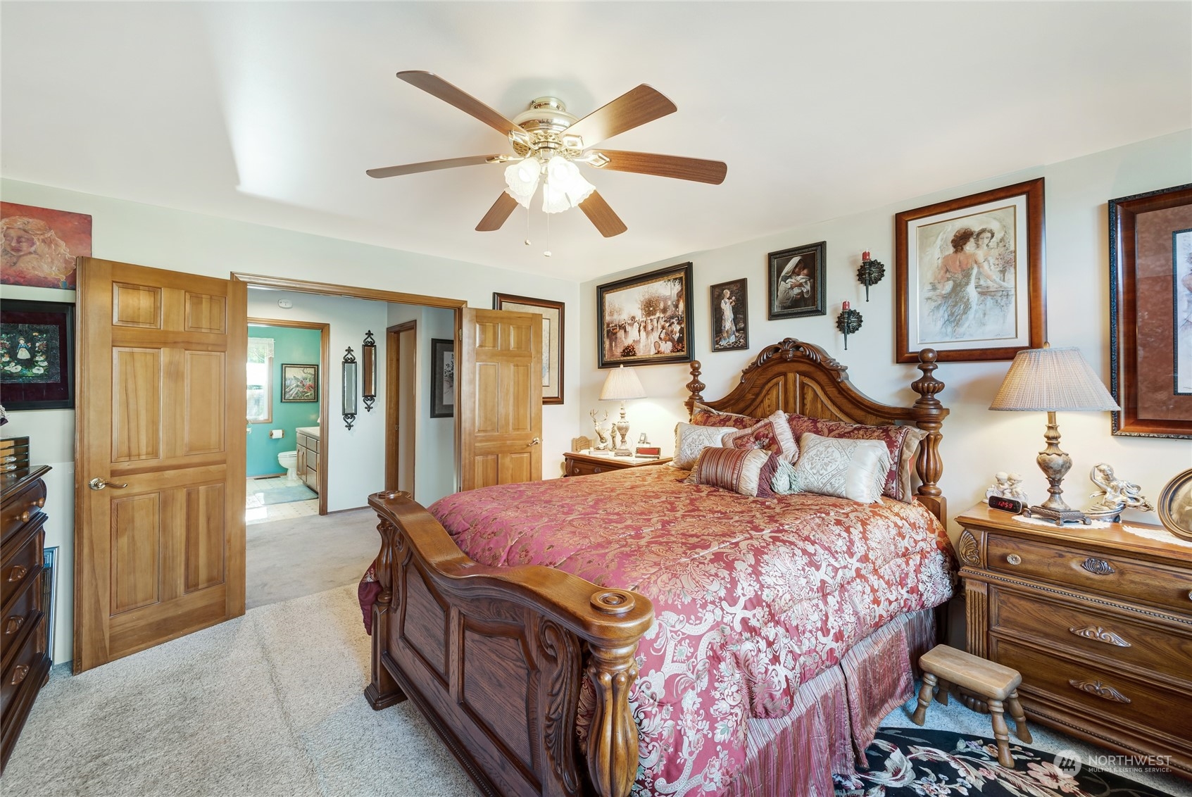 2914 184th Place Southeast Bothell, WA 98012 - Photo 20 of 40 a bedroom with a bed and a chandelier