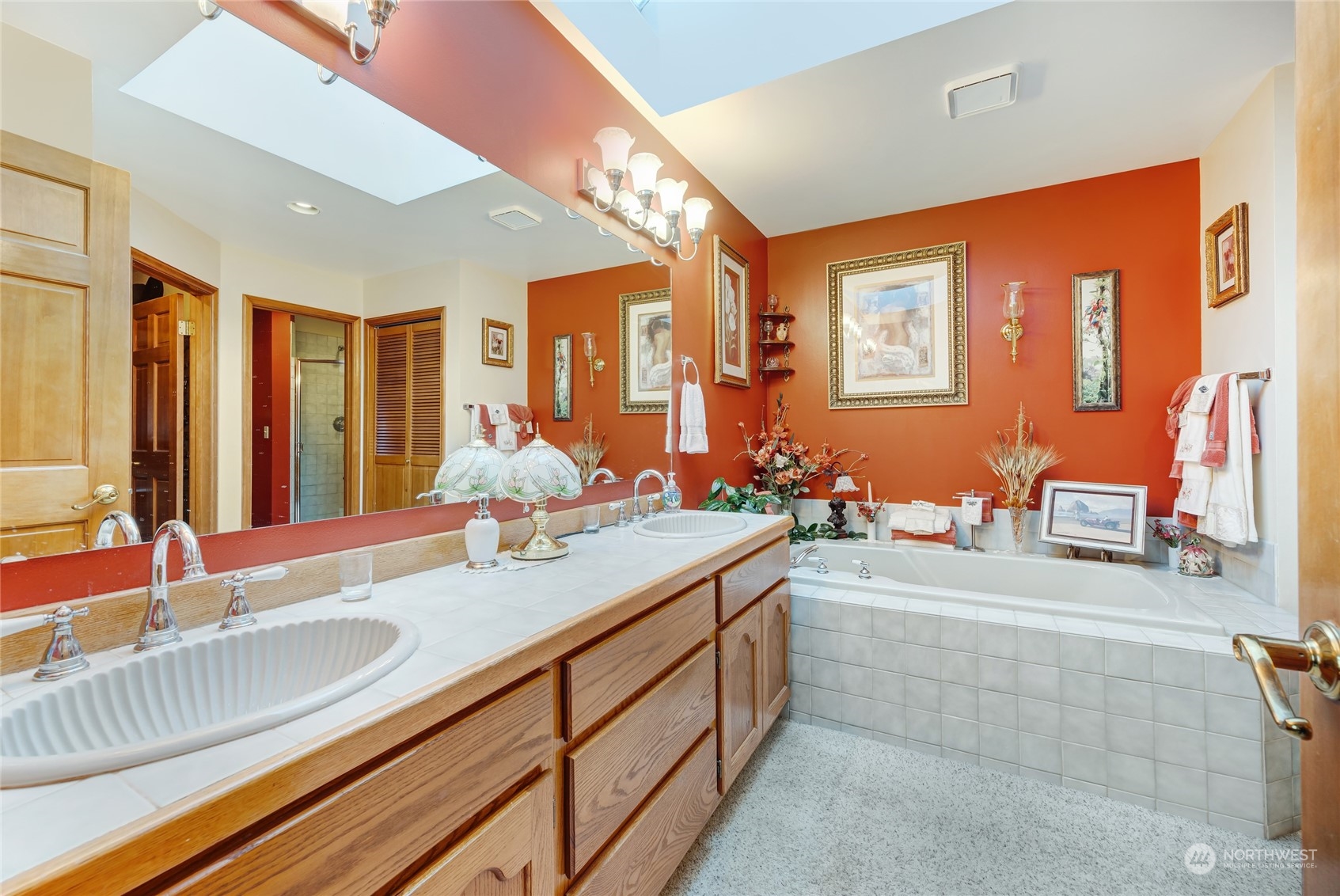 2914 184th Place Southeast Bothell, WA 98012 - Photo 21 of 40 a bathroom with a granite countertop sink and a large mirror