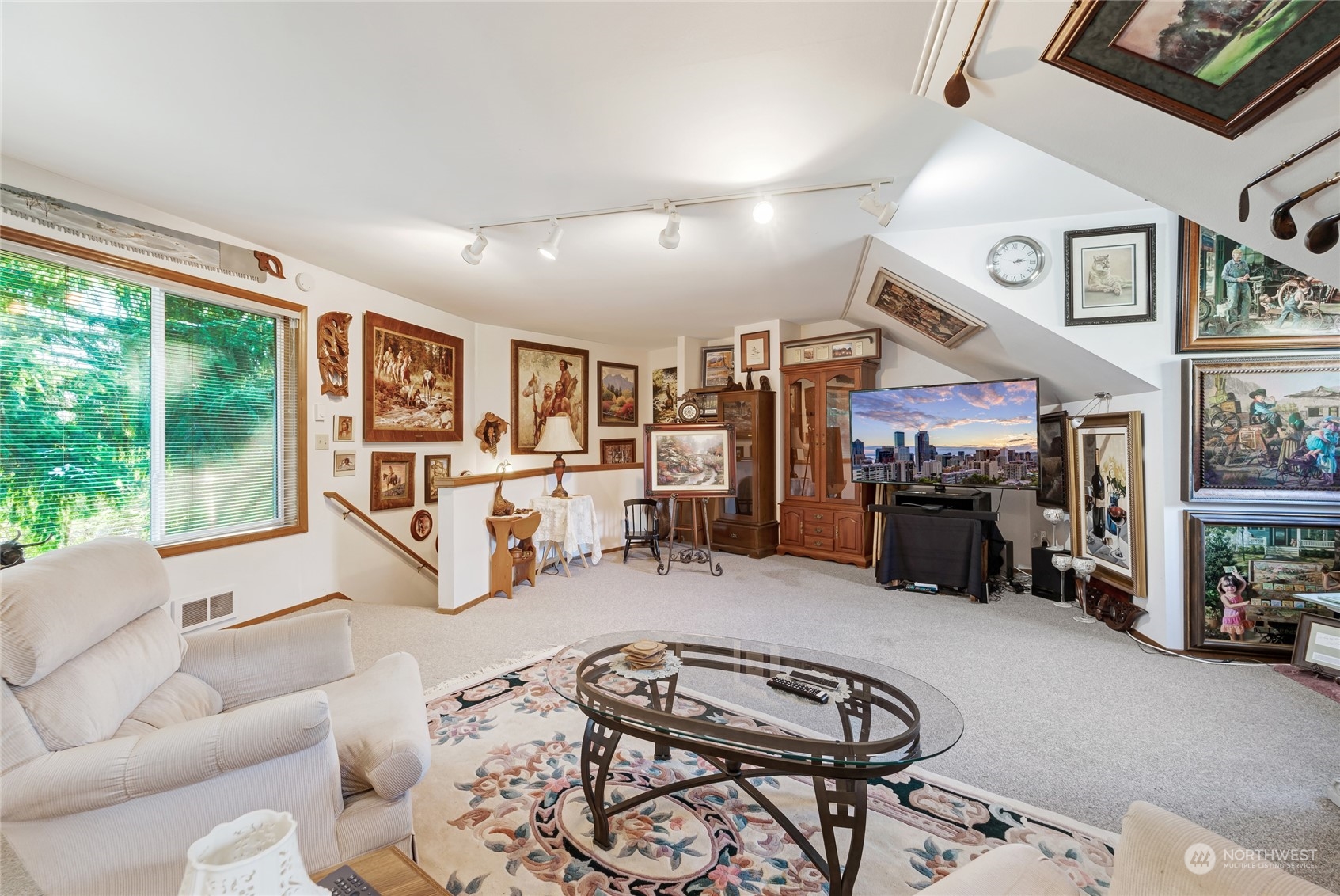 2914 184th Place Southeast Bothell, WA 98012 - Photo 27 of 40 a living room with furniture and a large window