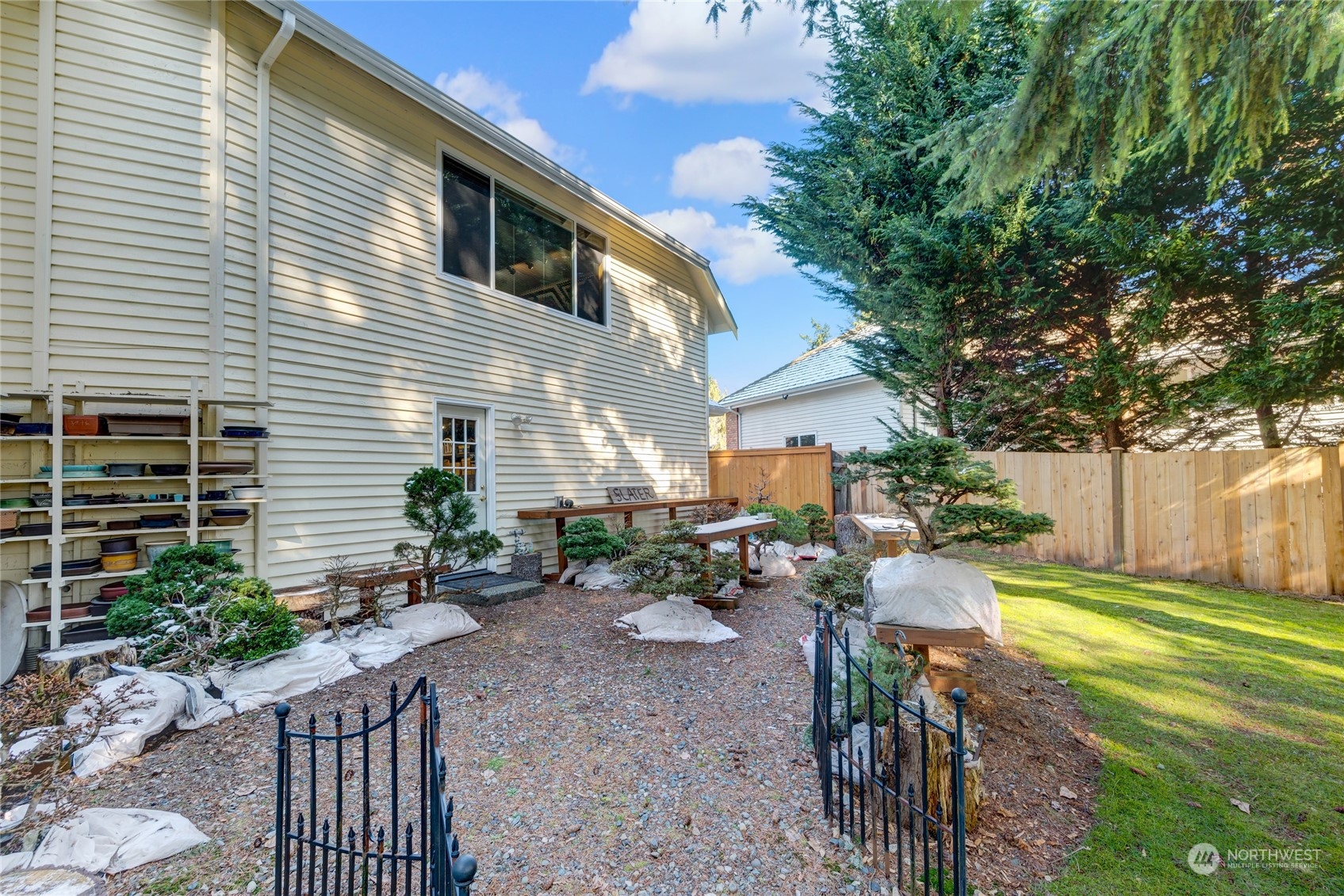 2914 184th Place Southeast Bothell, WA 98012 - Photo 34 of 40 a view of a backyard with plants and a patio