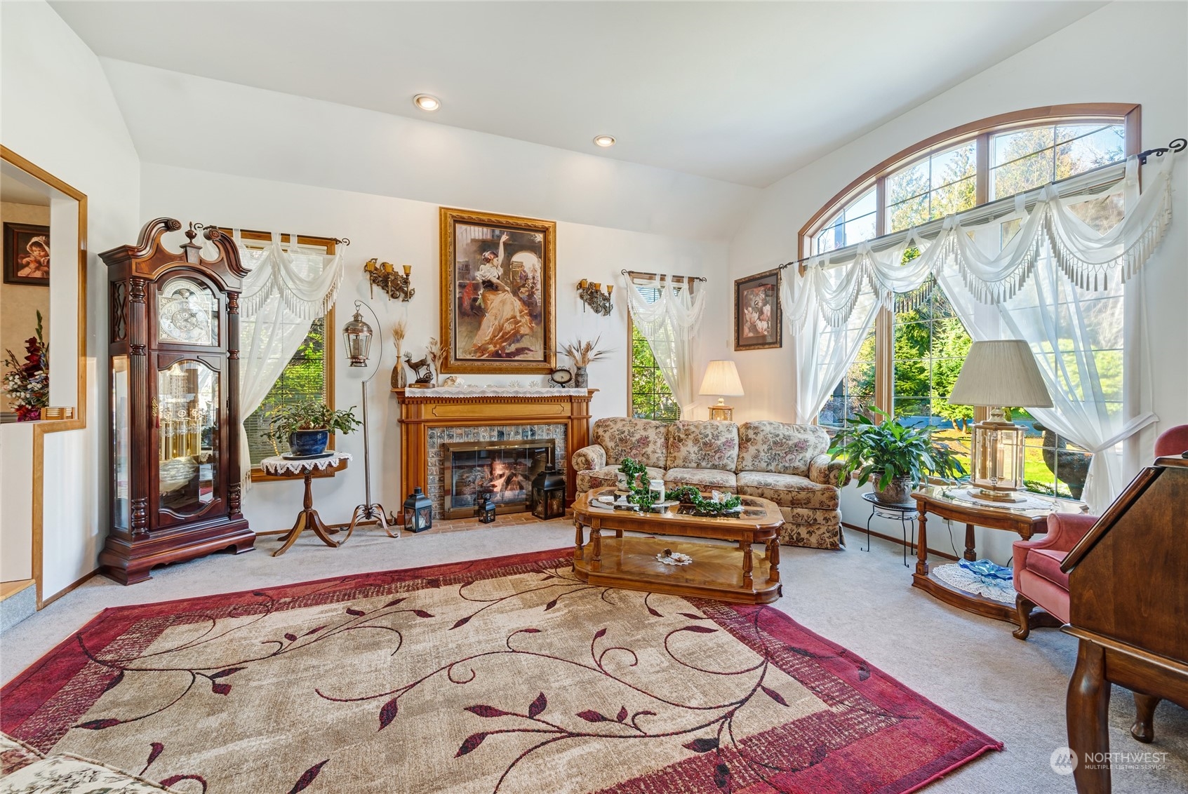 2914 184th Place Southeast Bothell, WA 98012 - Photo 4 of 40 a living room with furniture large window and a fireplace